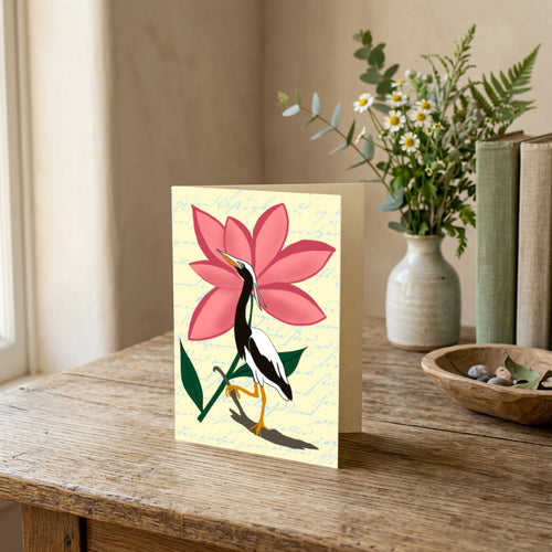Egret in Bloom portrait greeting card featuring a black-and-white bird and bold pink flower.