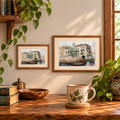 Venetian Waterways canal artwork displayed in two landscape wooden frames.